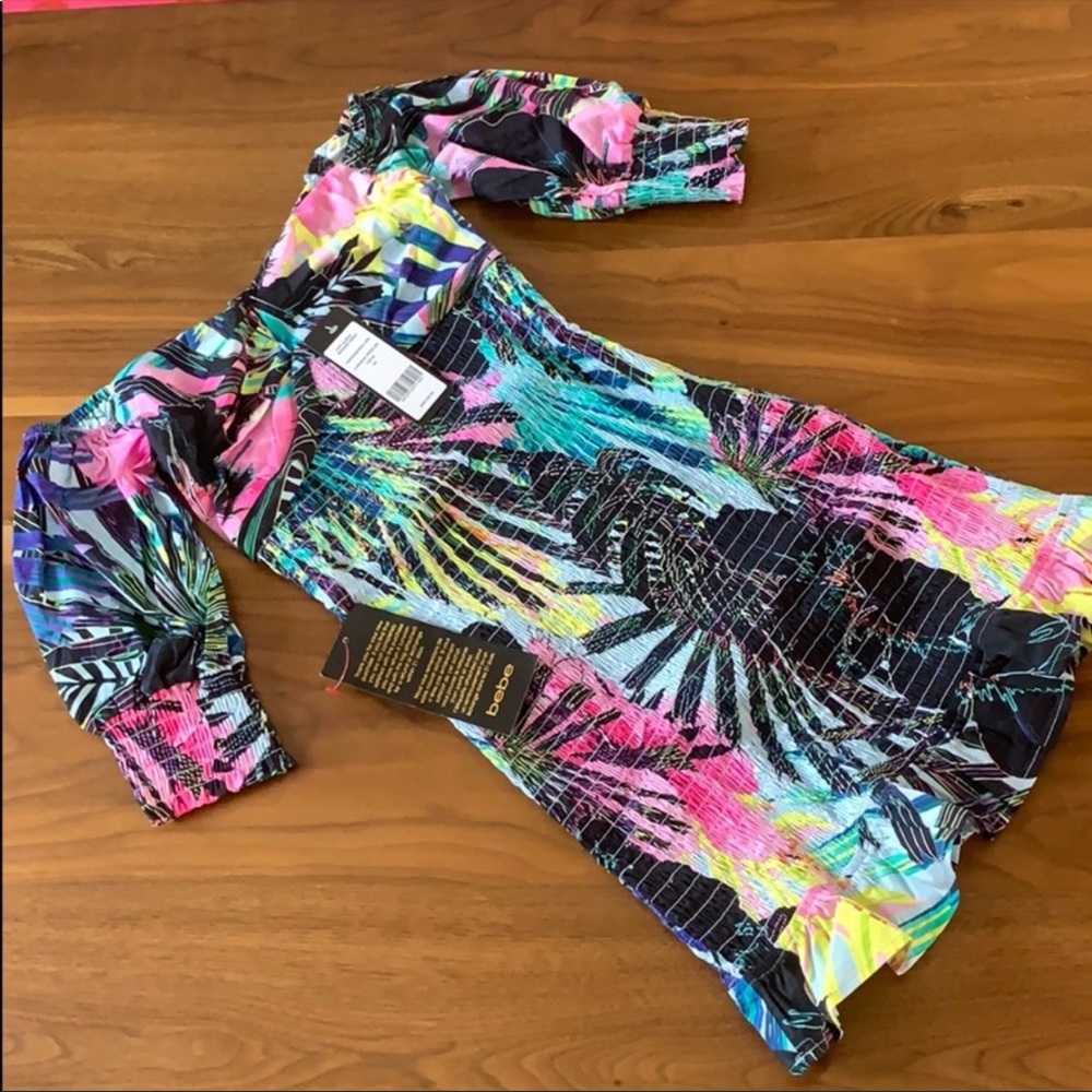 Bebe puff sleeve smocked dress.